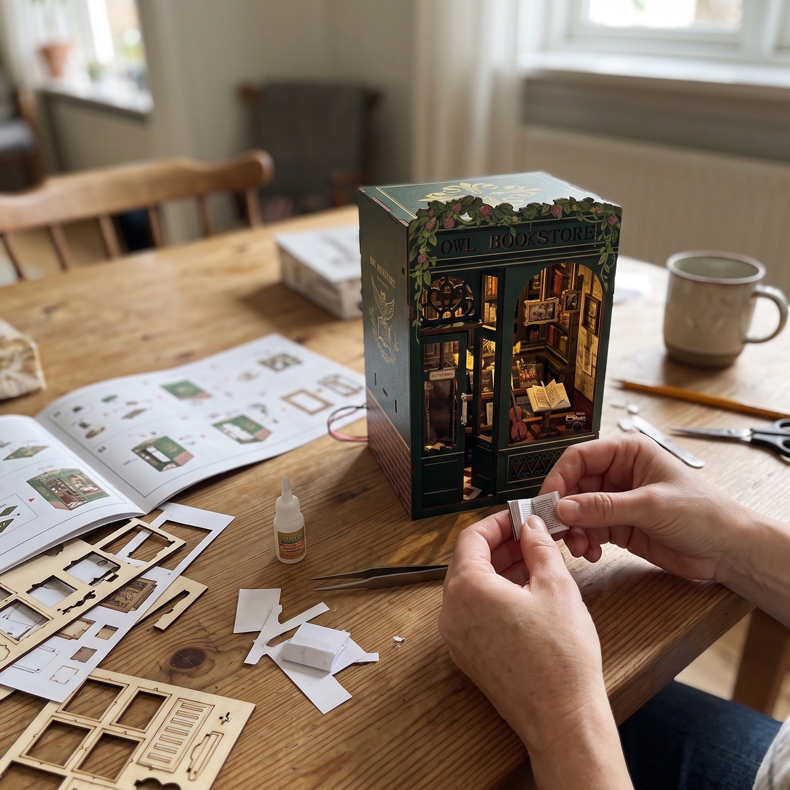 Book nook kit pieces on a home craft table