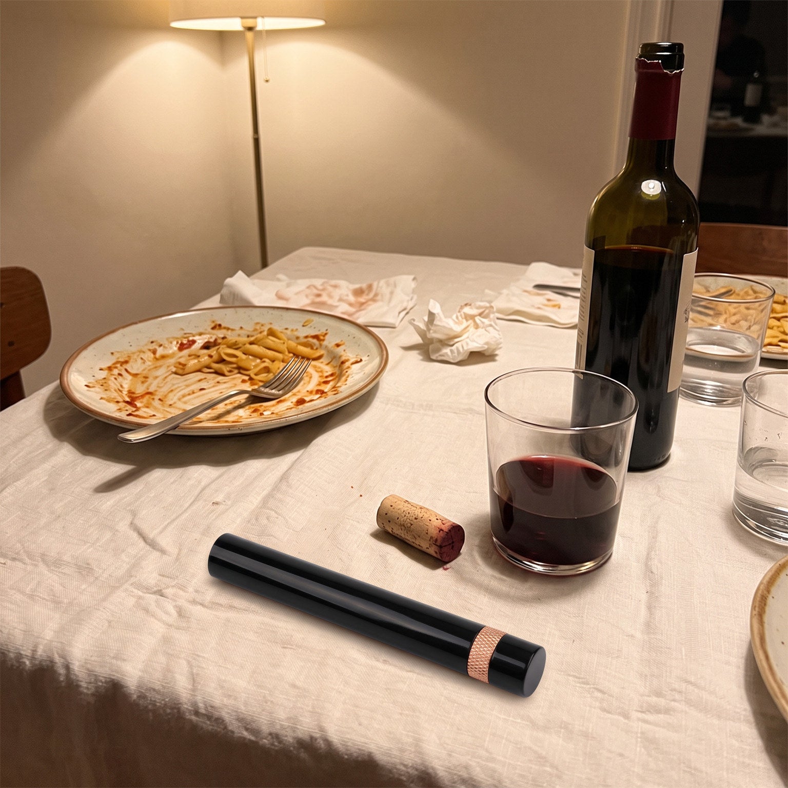 Rose Gold Openvale opener on a table after dinner